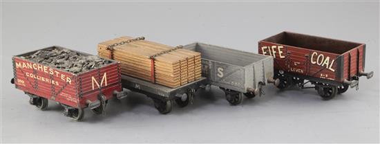 An LMS open wagon, no.5204, in grey, a Fife Coal open wagon 10T, no.8385, in red, a W.M. flat truck with load,
